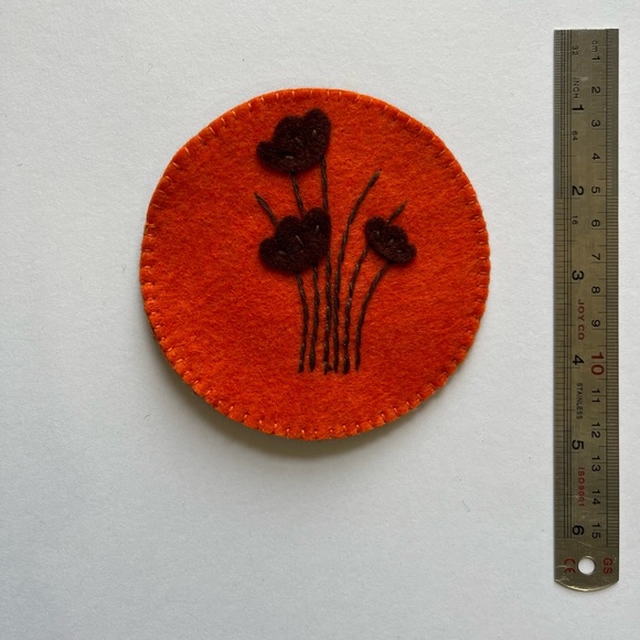 ‏Handcrafted felt coasters and embroidered with silk threads.at of 4 - Picture 2 of 5